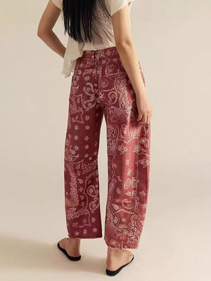 cream wide-leg jeans featuring pocketed and paisley