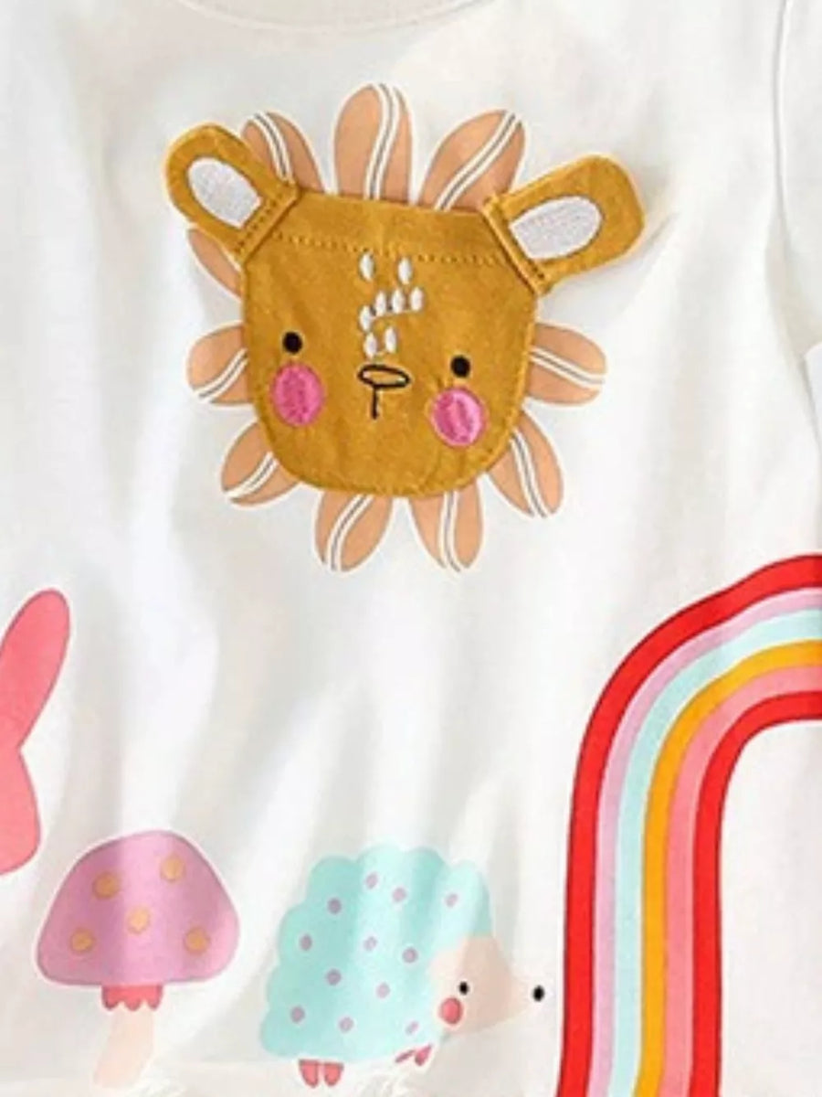 White cotton t-shirt with playful animal appliques including a lion, hedgehog, mushroom, and rainbow.