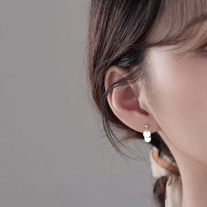 earrings in Silver with round pieces and short