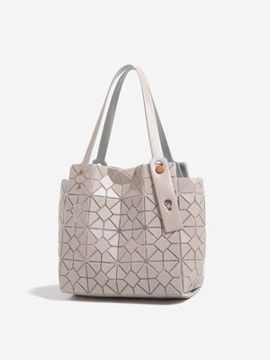 Pink handbag featuring structured and geometric
