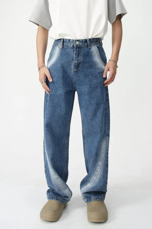 Faded panel wide-leg jeans in medium wash denim with a relaxed fit.