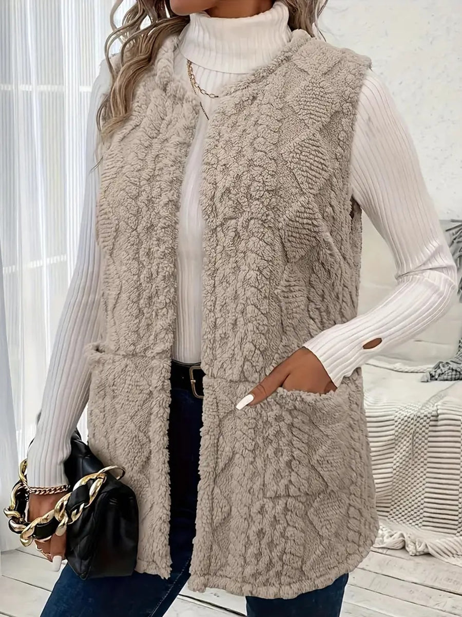 Light Blue vest featuring pocketed and geometric