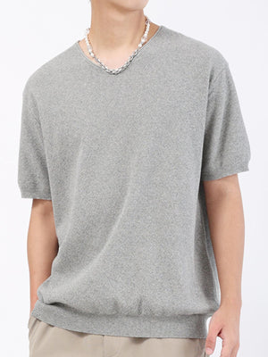 Men's gray knit t-shirt with V-neck and short sleeves.