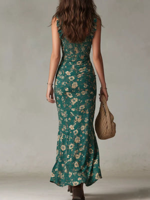 Dark green floral ruched maxi dress with ruffled straps and a fitted silhouette.