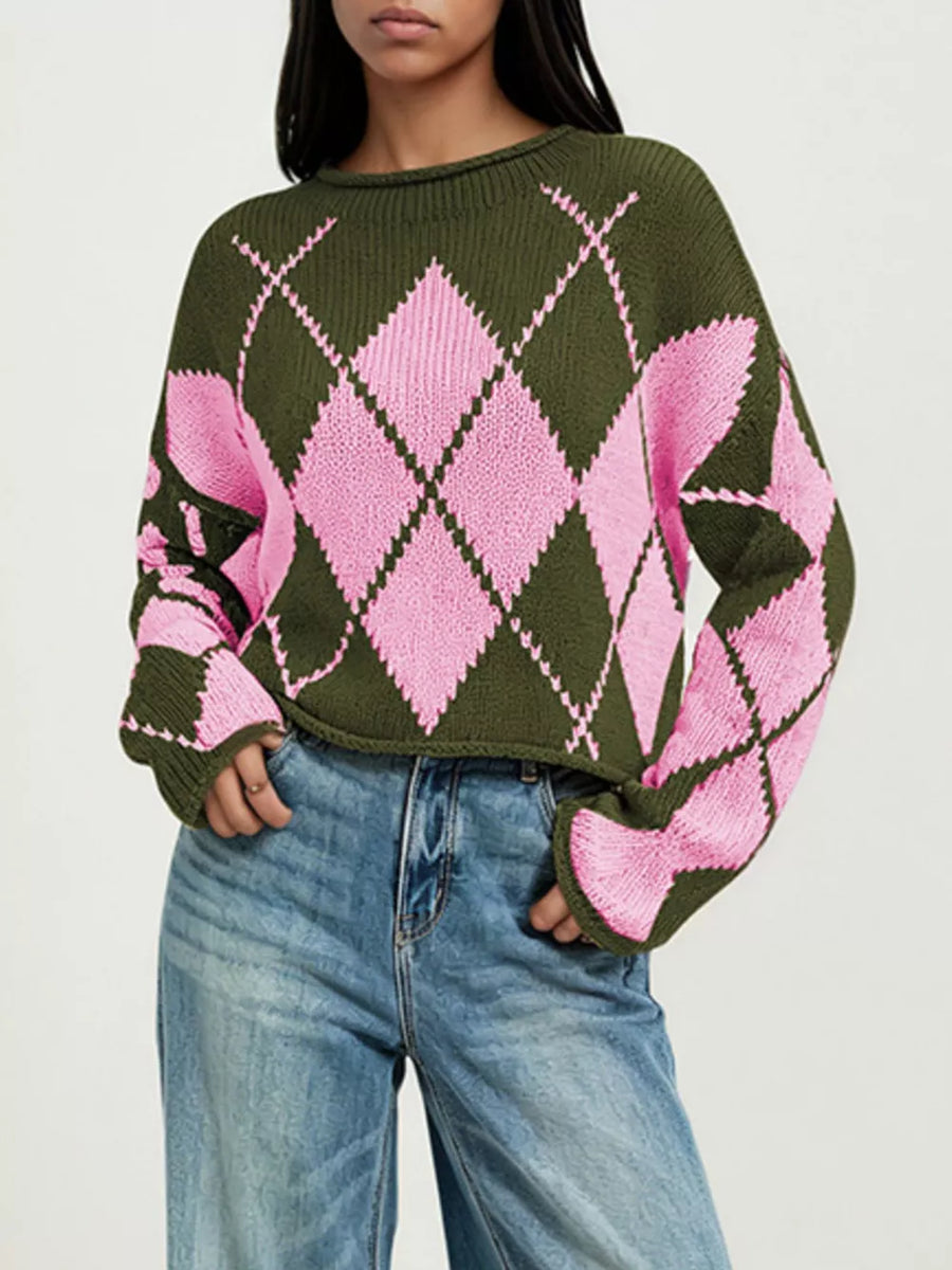 pink pullover sweater featuring ribbed cuffs and argyle