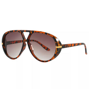 PC Frame material: Polycarbonate Lens material: Polycarbonate Temple material: P sunglasses in Caramel with oversized