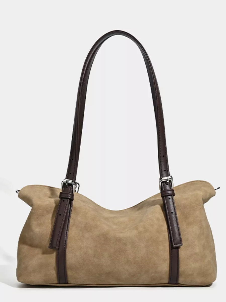 Brown suede medium shoulder bag with adjustable straps and dark brown trim.
