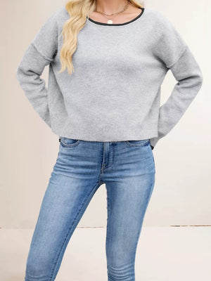 pullover sweater in light gray featuring ribbed and relaxed fit