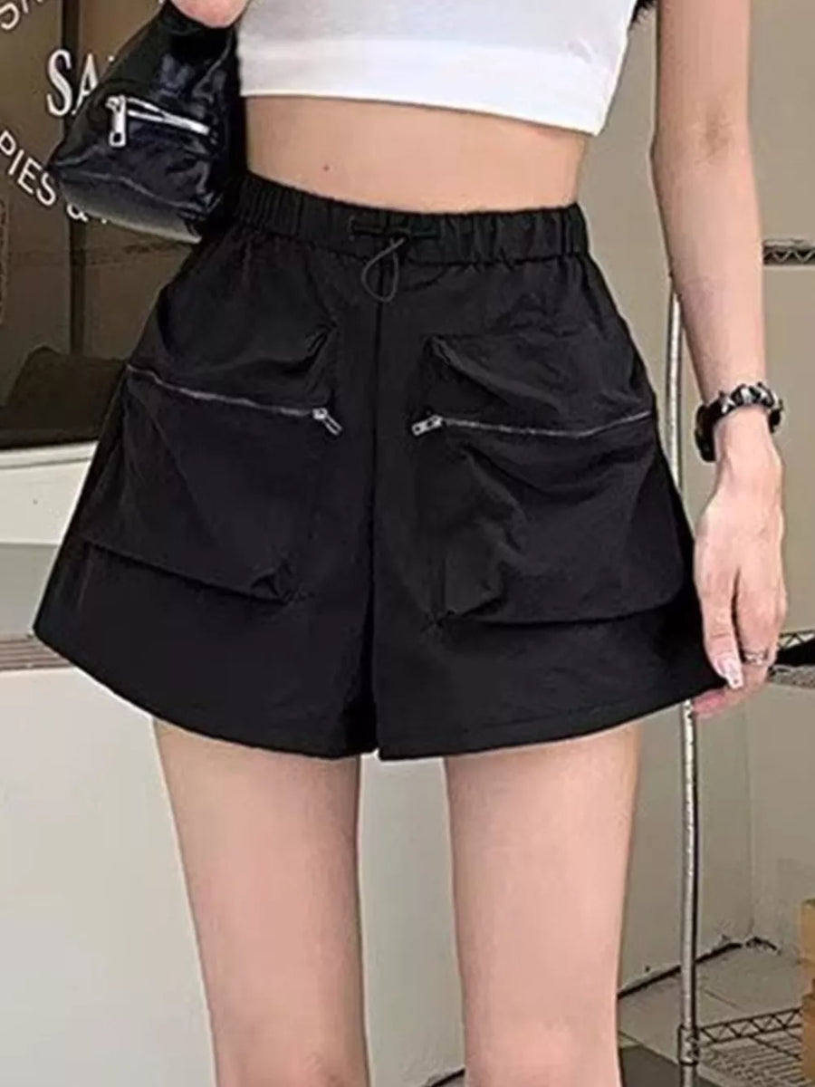 Black cargo shorts with adjustable drawstring and zippered pockets.