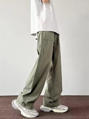 Men's green casual wide-leg cargo pants with visible stitching details.