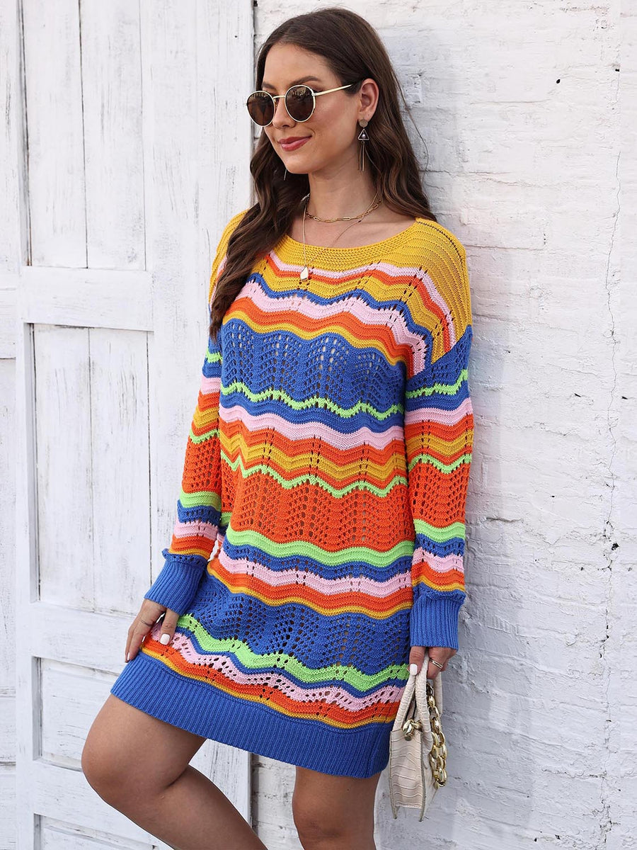 Chevron stripe knit mini dress with a crochet detail and a colorful striped pattern.