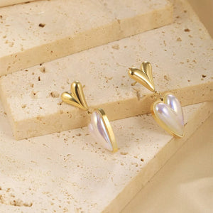 Synthetic Pearl, 18K Gold-Plated, Stainless Steel Care instructions: Avoid weari earrings in iridescent white with straight