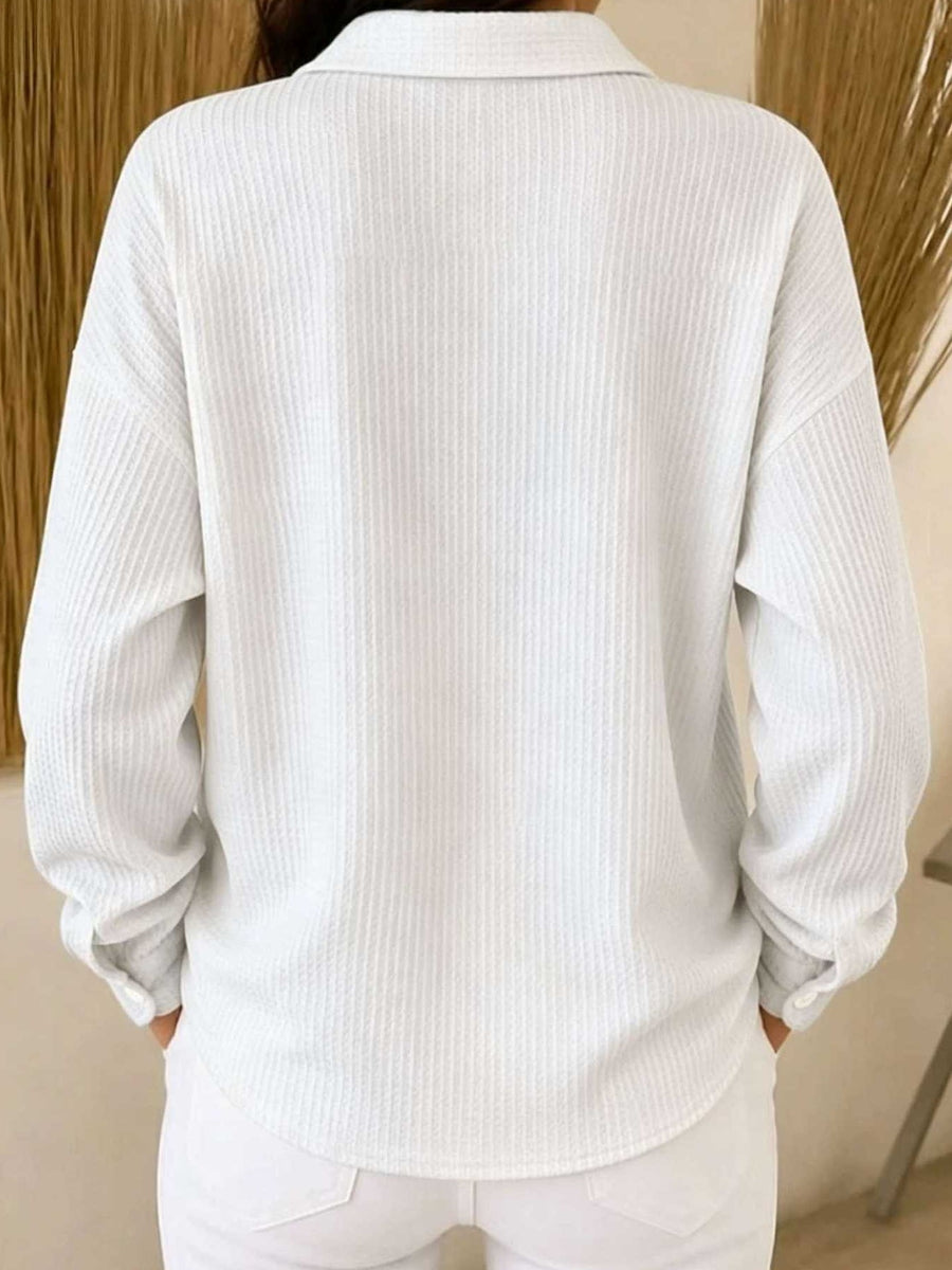 Light Blue button-down shirt with hip-length and button-front