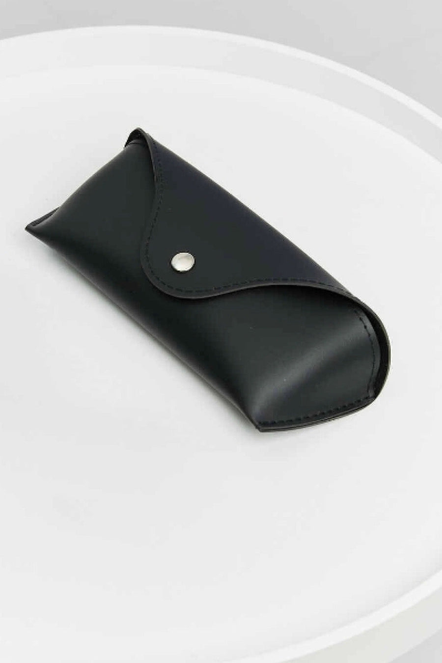 Black faux leather sunglasses case with snap closure
