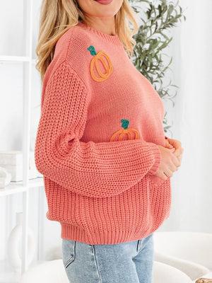 Burnt Coral embroidered pumpkin holiday sweater with crew neck and long sleeves.