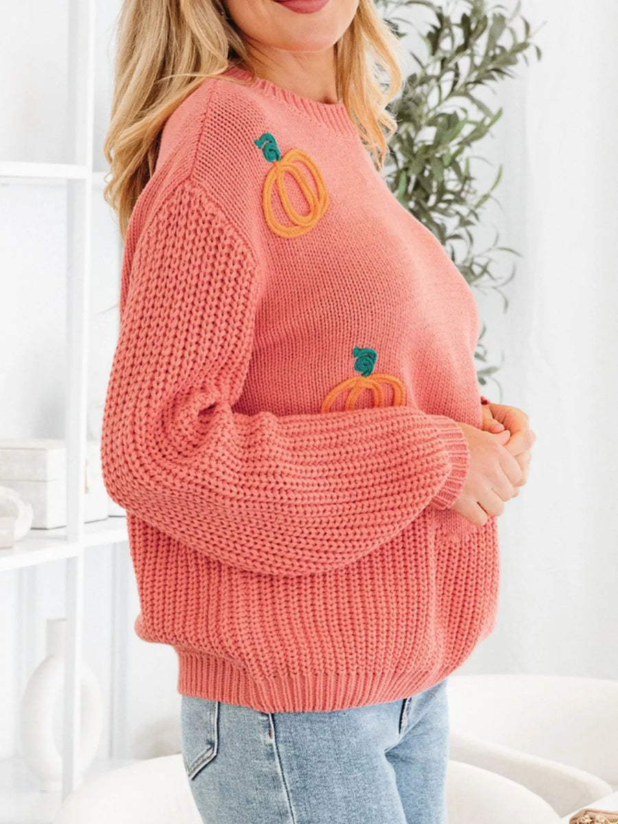 Burnt Coral embroidered pumpkin holiday sweater with crew neck and long sleeves.