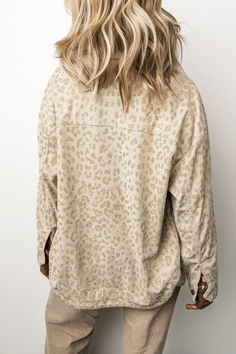 tan jacket featuring buttoned and leopard-print