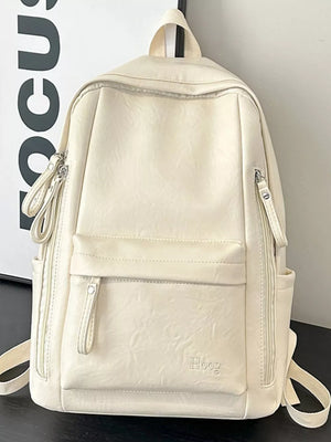 Chic white pu leather medium backpack with front pocket and zip details.