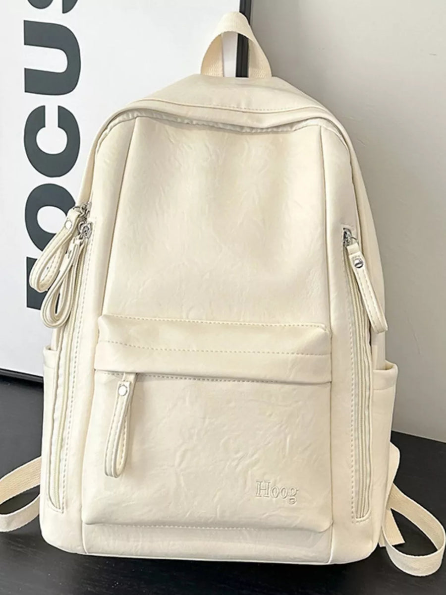 Chic white pu leather medium backpack with front pocket and zip details.