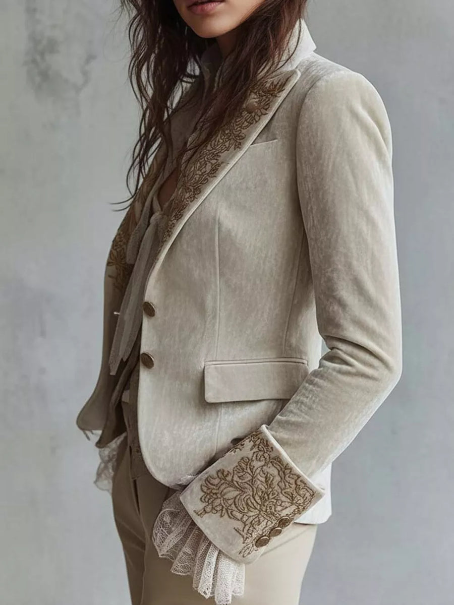 cream blazer with hip-length and button-front