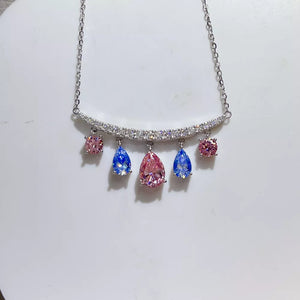 necklace in silver with teardrop moissanite charms and collar