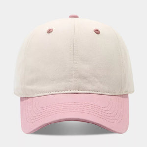 cap in cream featuring curved brim and structured fit