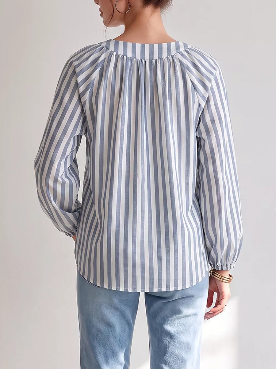 light blue blouse featuring lace-up and striped