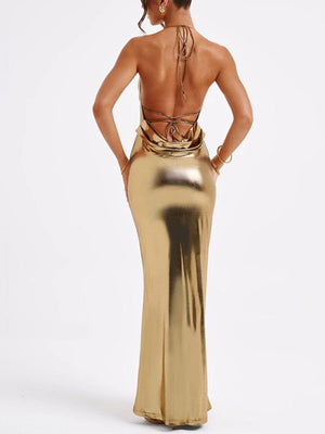 Gold backless ruched maxi dress with halter tie and cowl back detail.