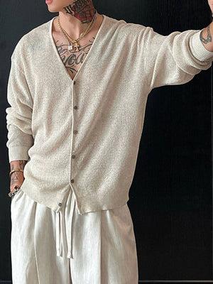 100% Polyester Care instructions: Machine wash cold cardigan in Apricot with relaxed silhouette