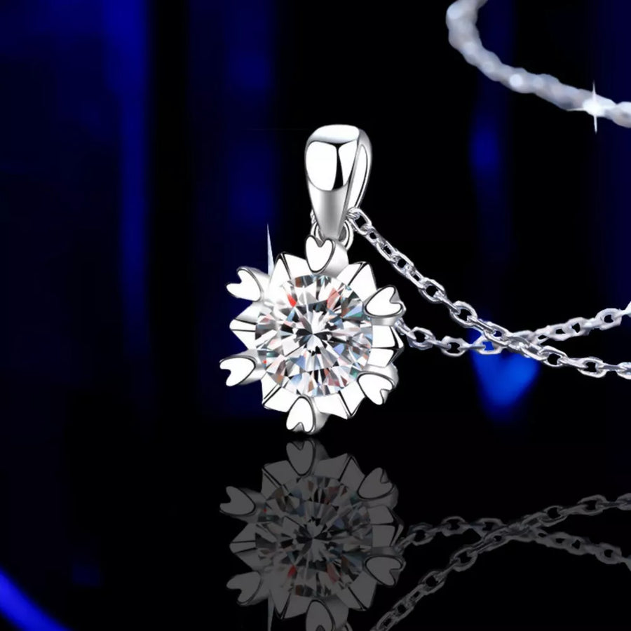 clear necklace featuring flower pendant and floral