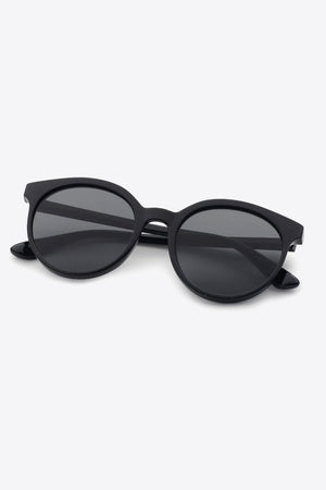 Black round frame sunglasses with dark lenses