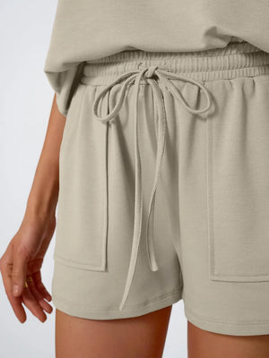Khaki relaxed fit drawstring shorts with elastic waist and pockets