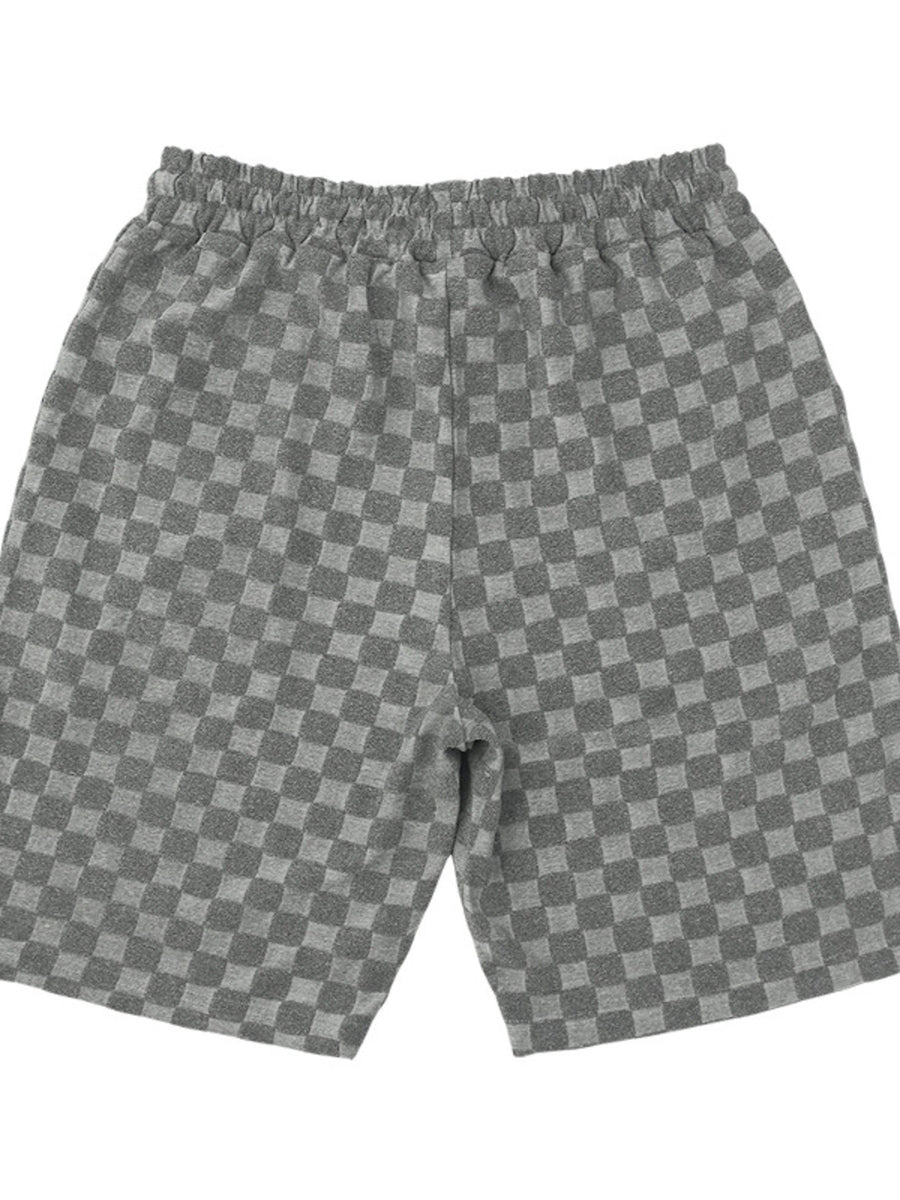 Dark gray checkered chino shorts with drawstring waist and textured fabric.