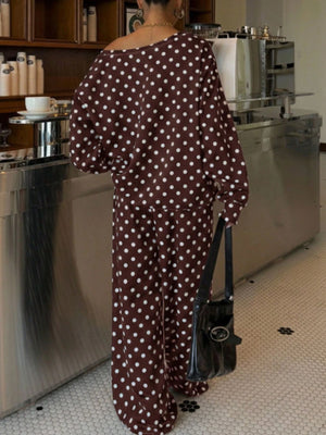 100% polyester Care instructions: Machine wash cold pajama set in Black with oversized silhouette
