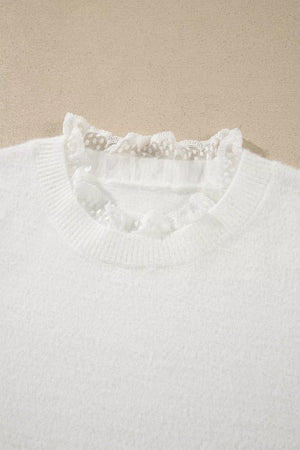 ivory pullover sweater with patchwork detail and long sleeve