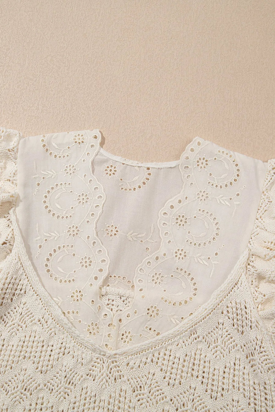 Beige crochet knit vest with eyelet yoke and embroidered details