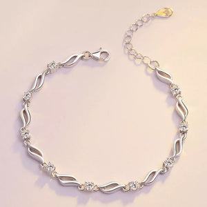 clear bracelet featuring zircon embellishments and geometric