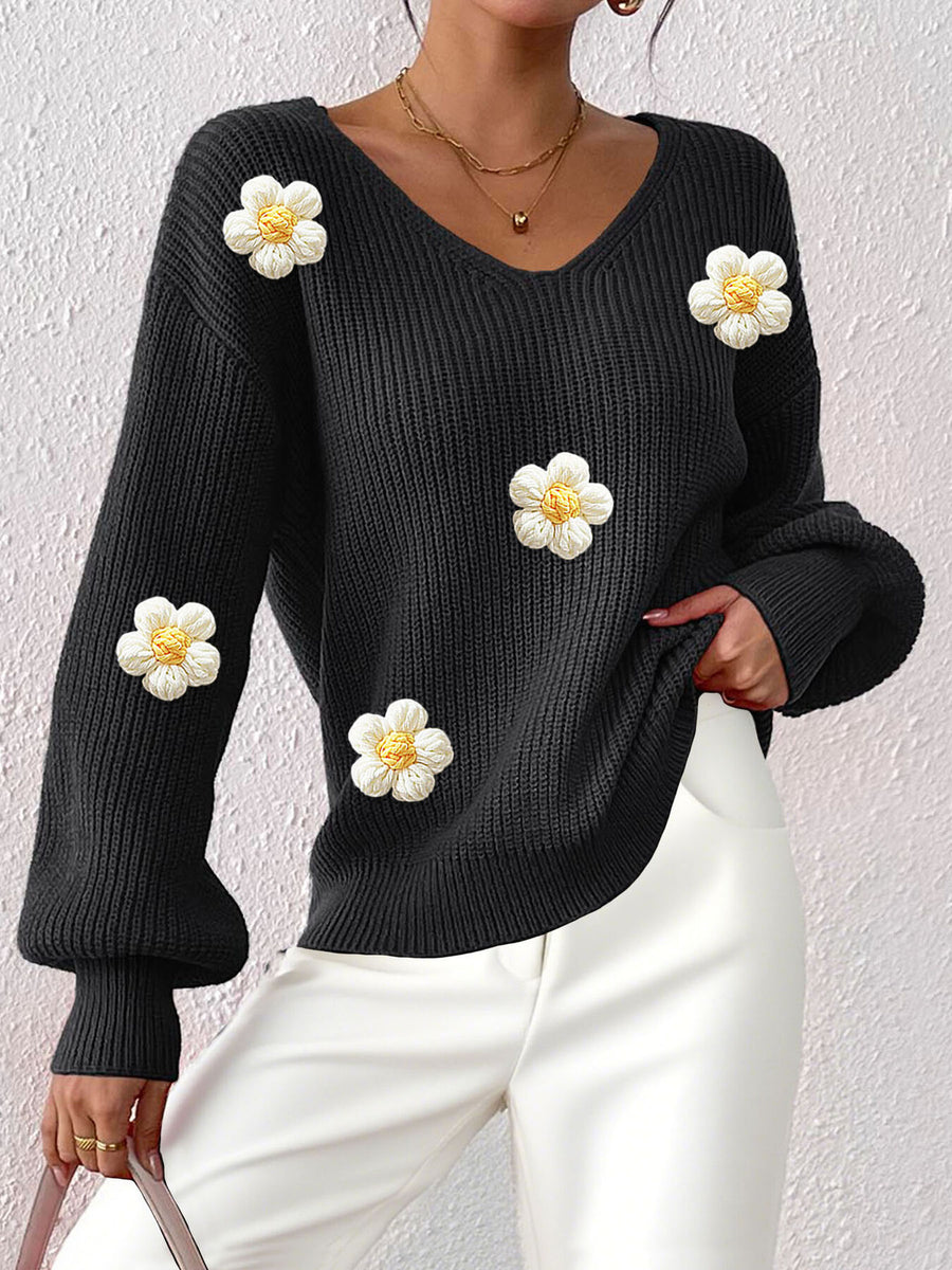 Orange v-neck sweater with applique and long sleeve