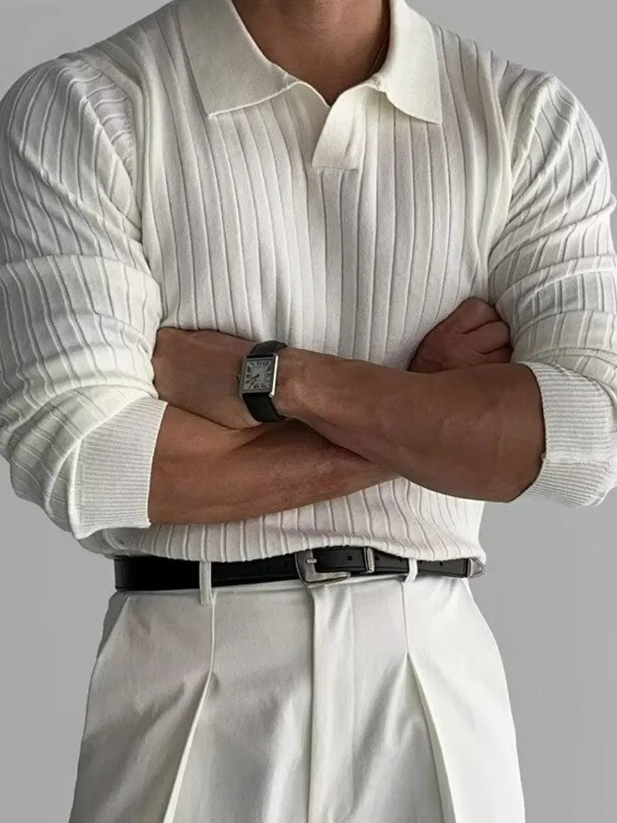 Ivory ribbed knit polo shirt with long sleeves and a classic collar.