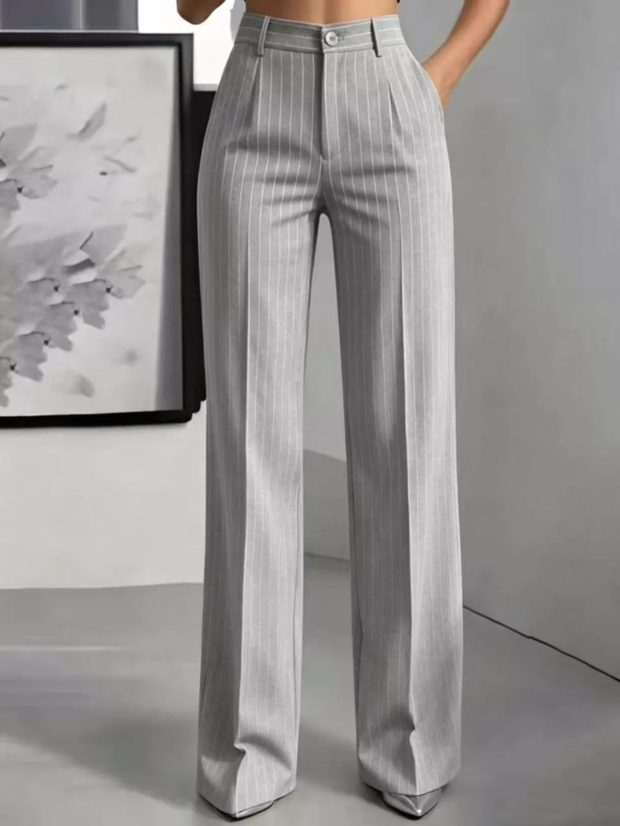 Brown wide-leg pants featuring buttoned and striped