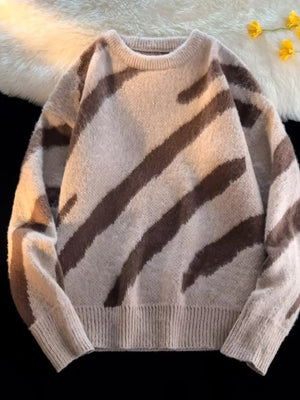 Oversized fuzzy knit pullover sweater in khaki with brown diagonal stripes and crew neck.