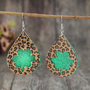 Leopard print teardrop earrings with green glitter shamrock cutouts