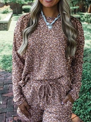 Leopard print ribbed loungewear set with drawstring shorts and long sleeve top.