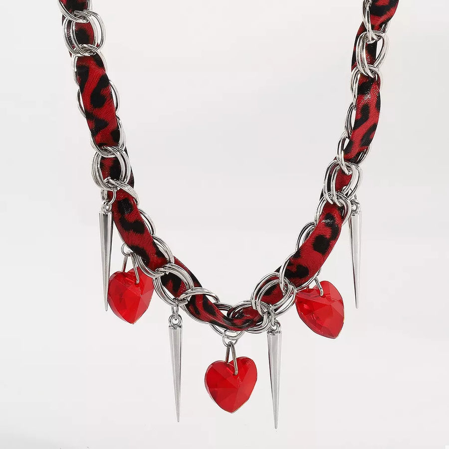 necklace in silver with leopard-print and heart charms