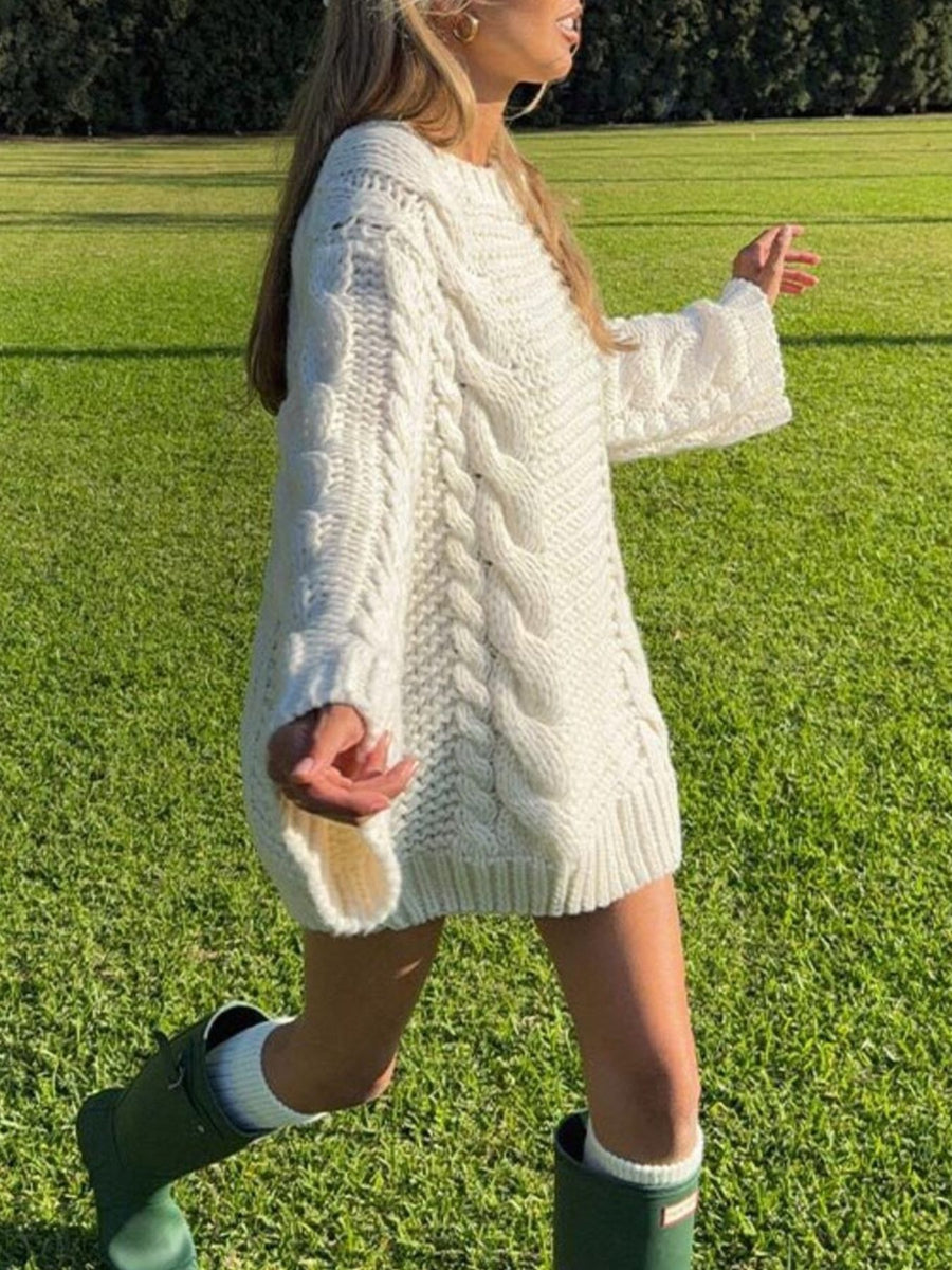 100% polyester Care instructions: Machine wash cold pullover sweater in cream with oversized silhouette