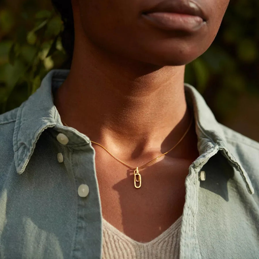 necklace in gold featuring pendant and delicate geometric fit