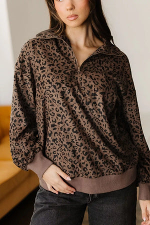 black sweatshirt featuring zipper and leopard