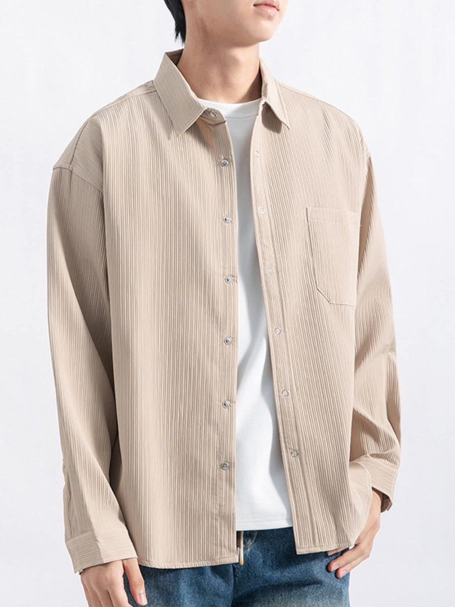 Black button-down shirt with hip-length and button-front