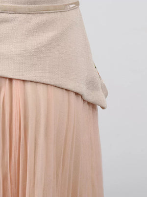 Embroidered tulle midi dress with sheer sleeves in a light pink hue, featuring a textured bodice.