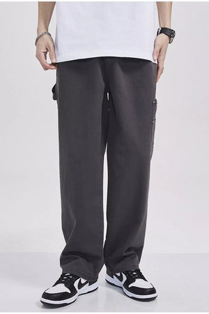 Relaxed fit dark gray cargo sweatpants with utility pocket detail.